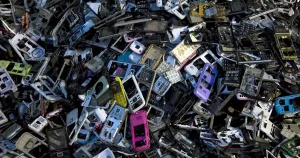 Bulk old mobile phones and smartphone scrap collected for e-waste recycling